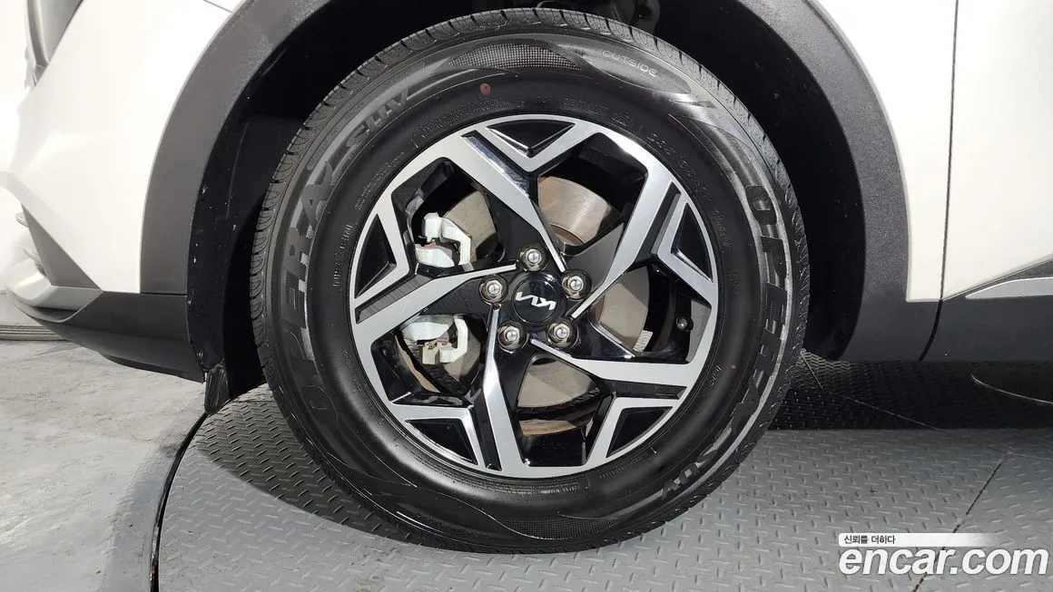 Kia Sportage — фото 10