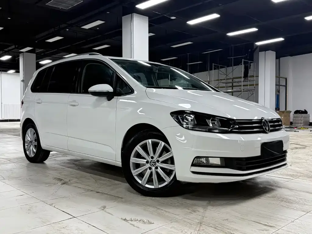 Volkswagen Touran — фото 5