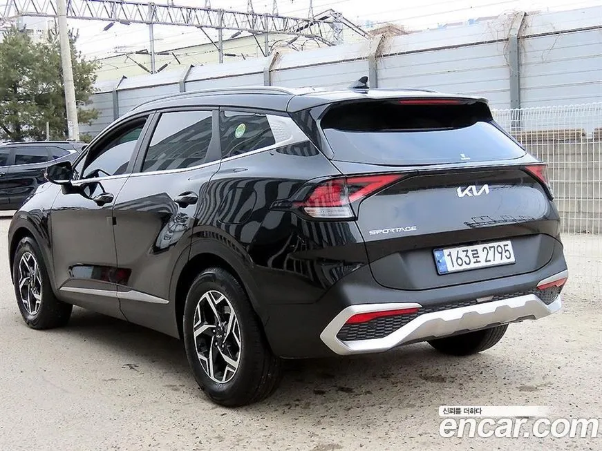 Kia Sportage — фото 9