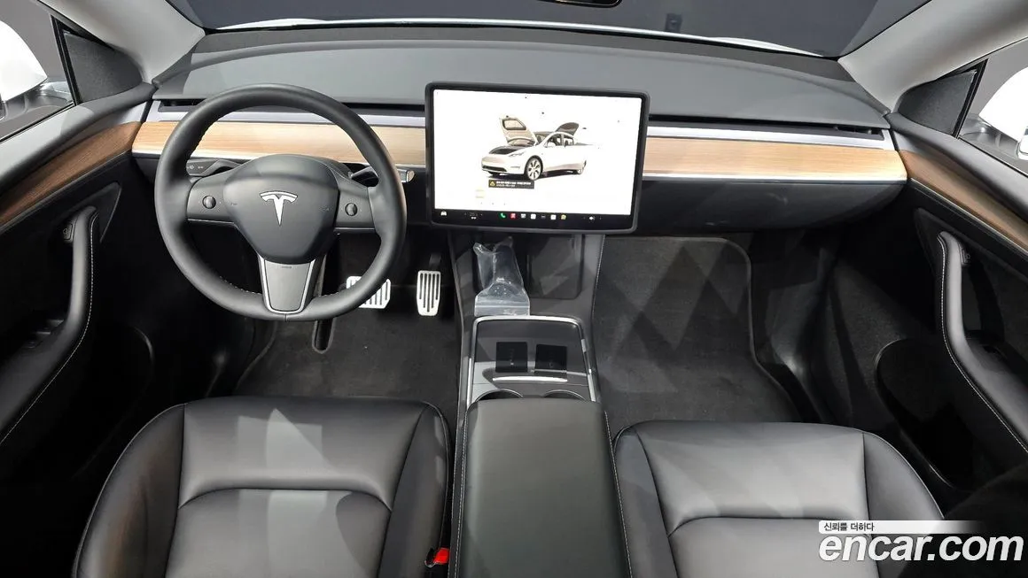Tesla Model Y — фото 6