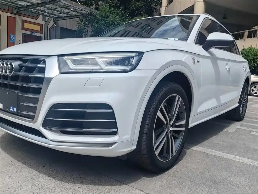 Audi Q5L — фото 5