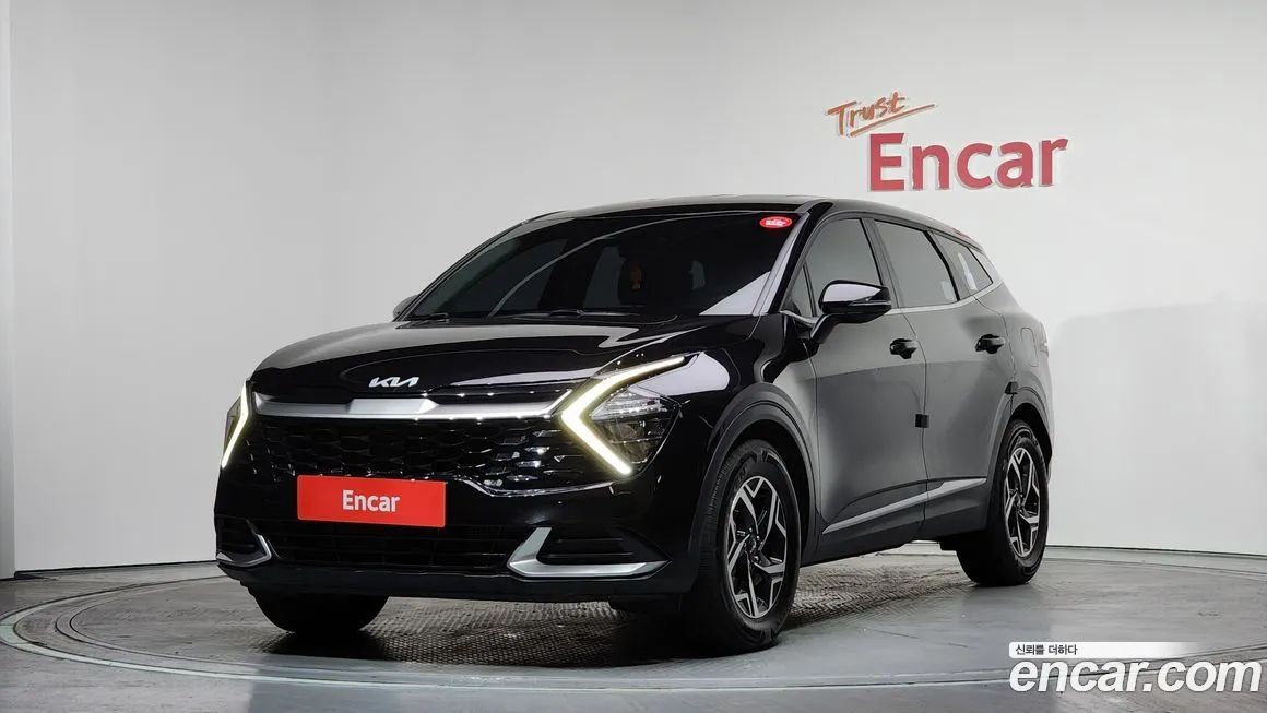 Kia Sportage — фото 1