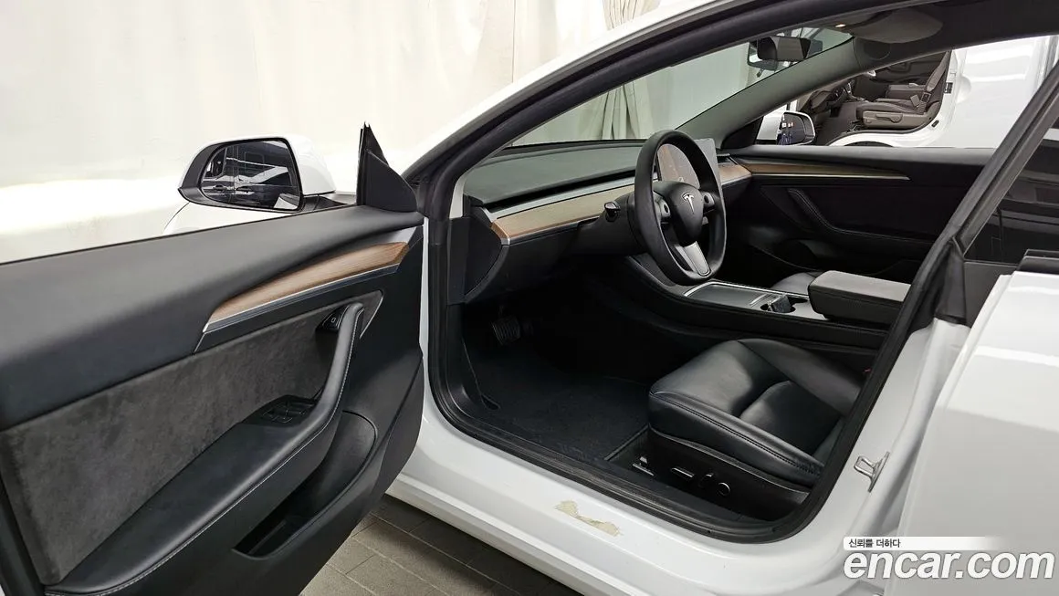 Tesla Model 3 — фото 7