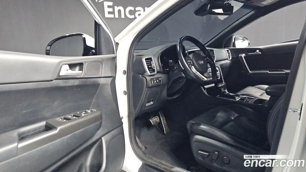 Kia Sportage — фото 10