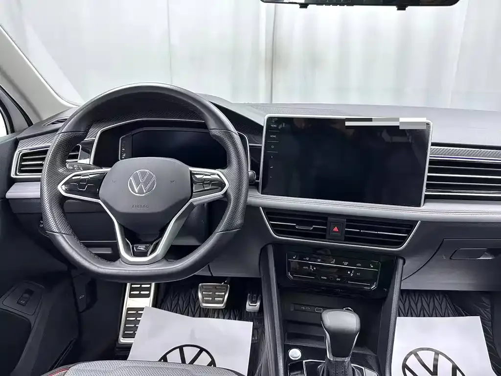 Volkswagen Tiguan L — фото 9