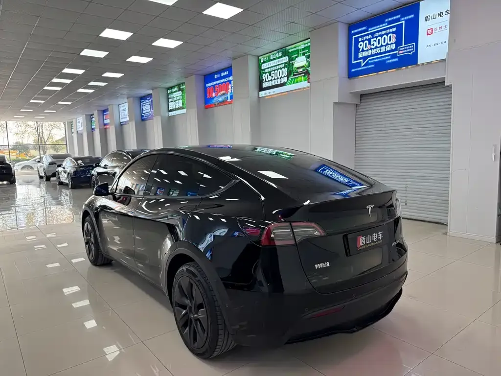 Tesla Model Y — фото 7
