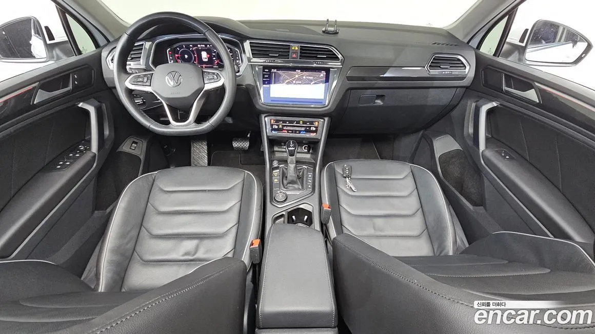 Volkswagen Tiguan — фото 7