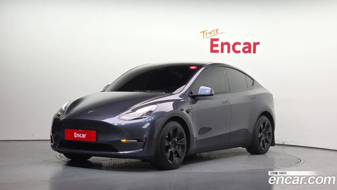 Tesla Model Y — фото 1