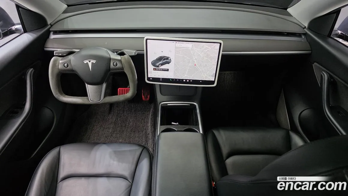 Tesla Model Y — фото 10