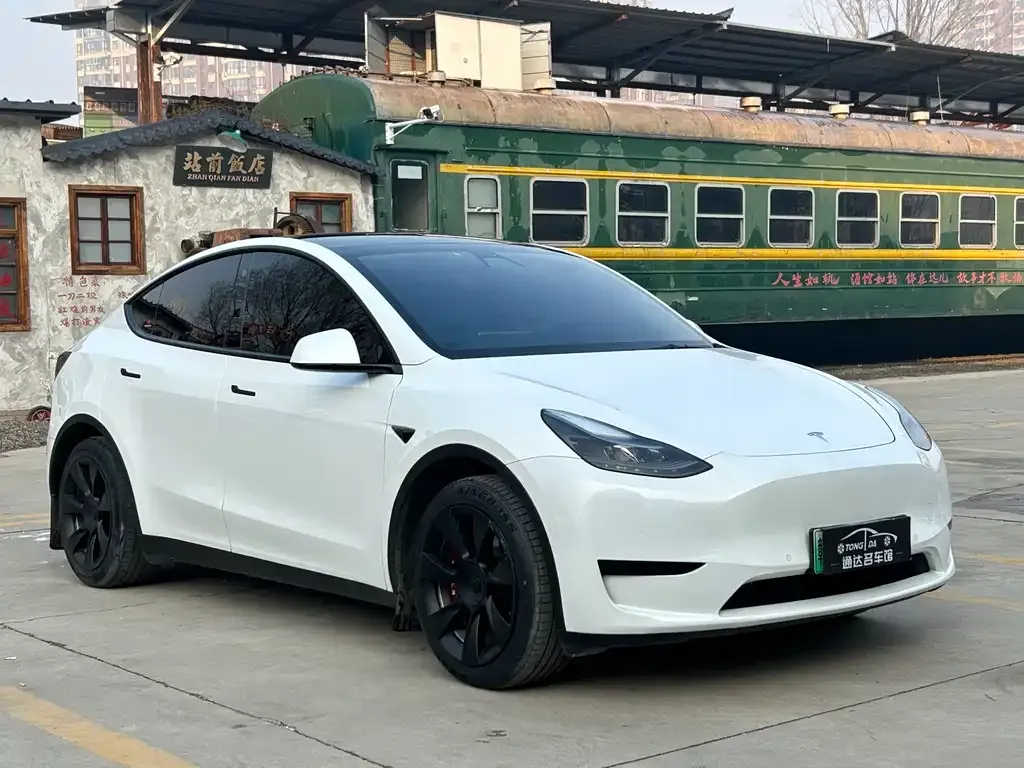 Tesla Model Y — фото 8