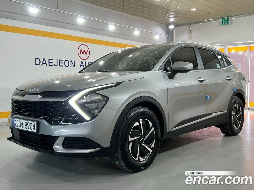 Kia Sportage — фото 1