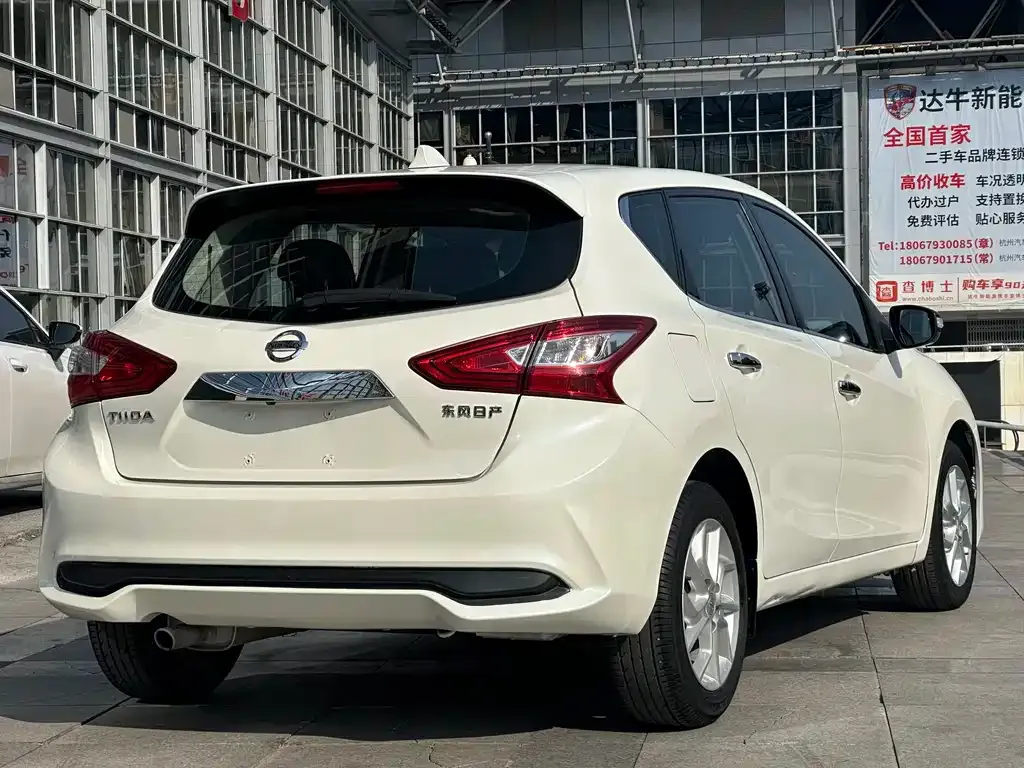 Nissan Tiida — фото 10