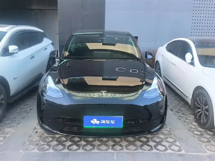 Tesla Model Y — фото 9