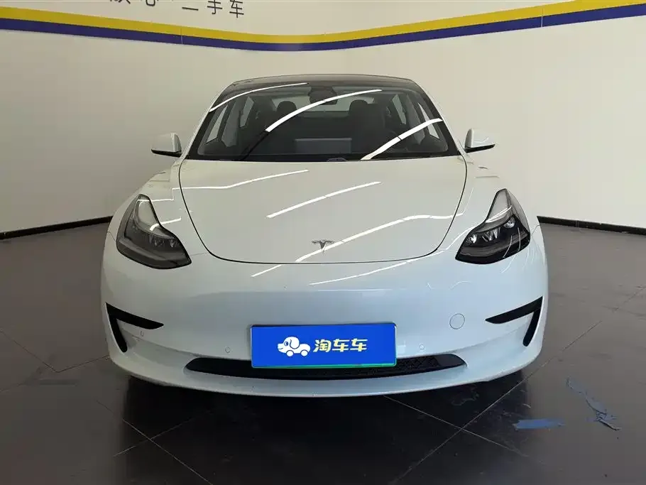 Tesla Model 3 — фото 7