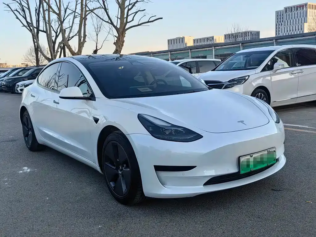 Tesla Model 3 — фото 7