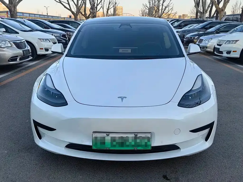 Tesla Model 3 — фото 10