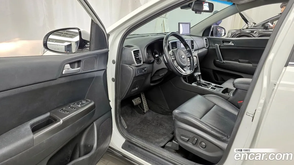 Kia Sportage — фото 9