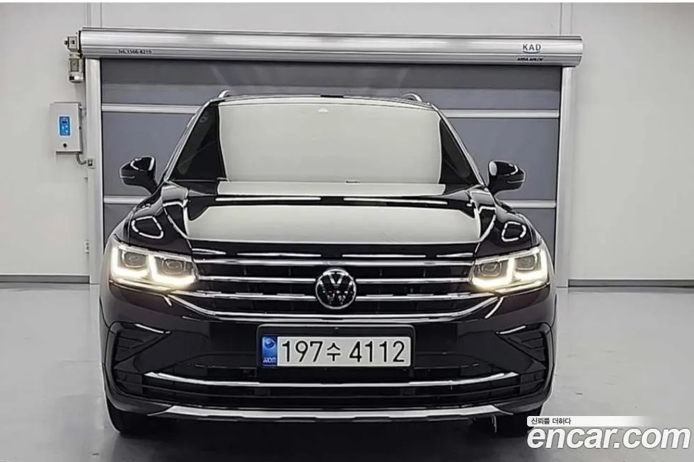 Volkswagen Tiguan — фото 1