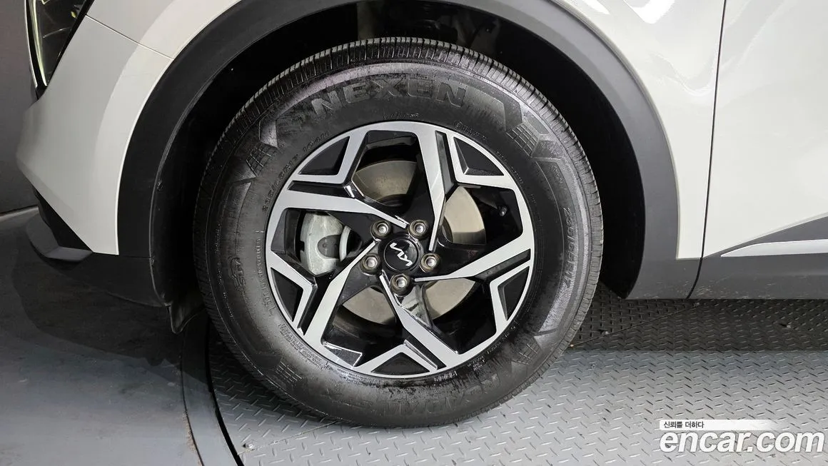 Kia Sportage — фото 6