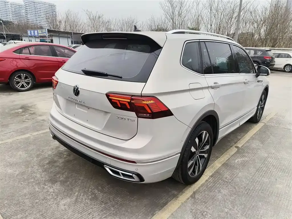 Volkswagen Tiguan L — фото 7