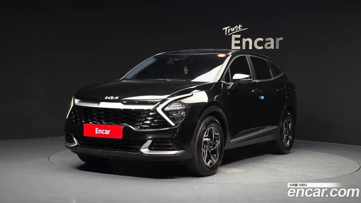 Kia Sportage — фото 1