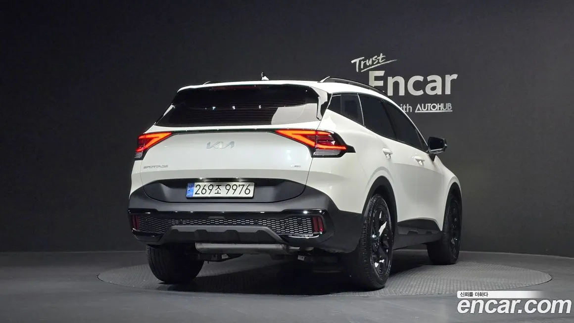 Kia Sportage — фото 7