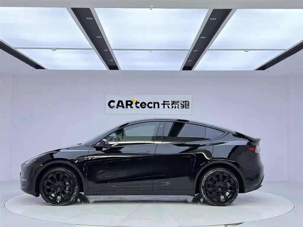 Tesla Model Y — фото 7