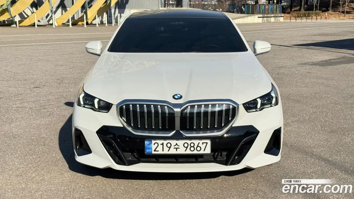 BMW 5-Series — фото 1
