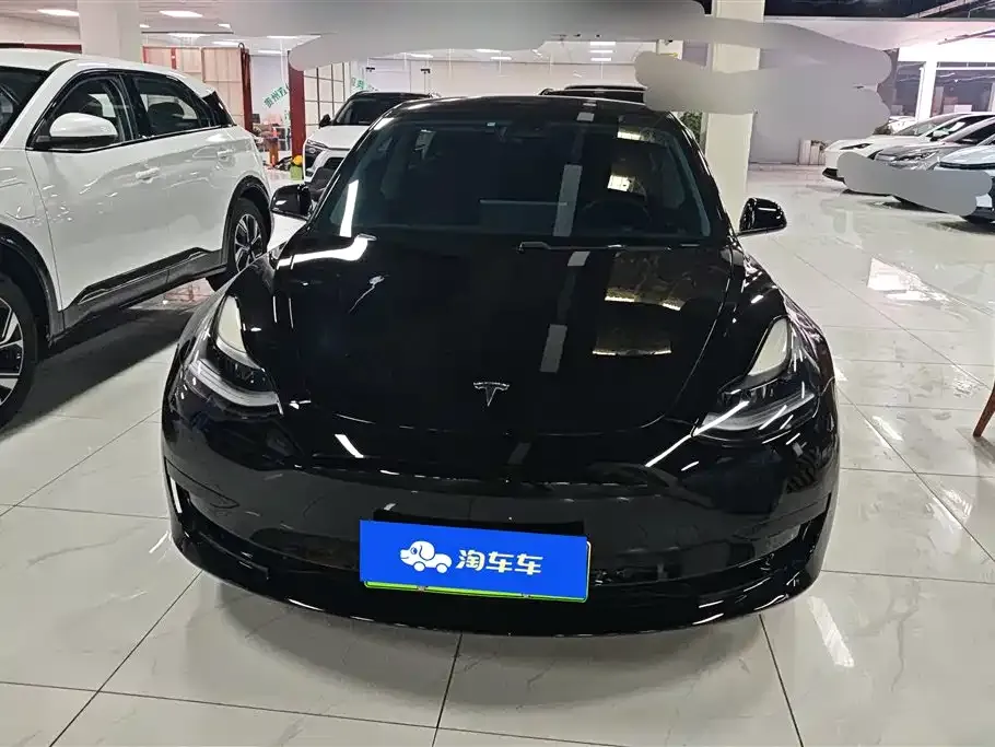 Tesla Model 3 — фото 10