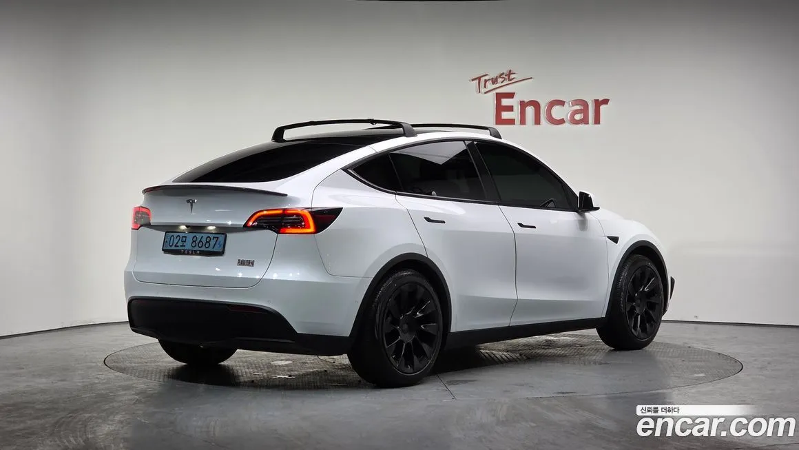 Tesla Model Y — фото 6