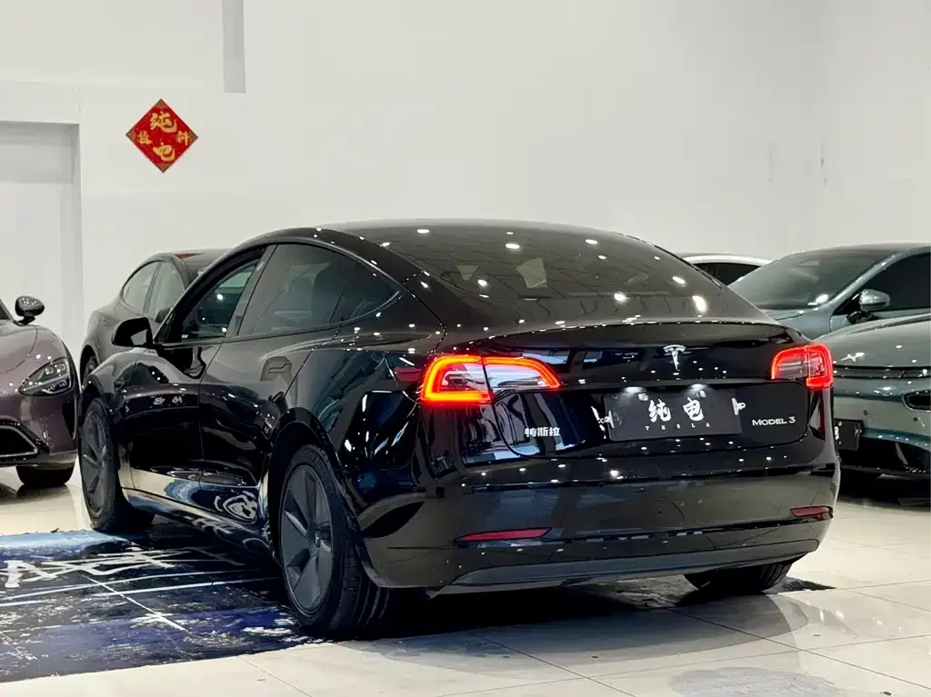 Tesla Model 3 — фото 10