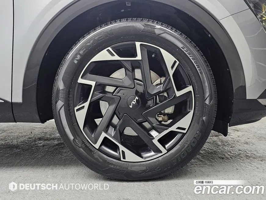 Kia Sportage — фото 10