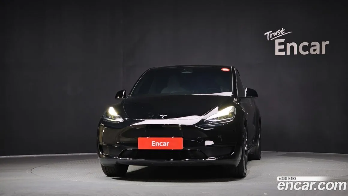 Tesla Model Y — фото 10