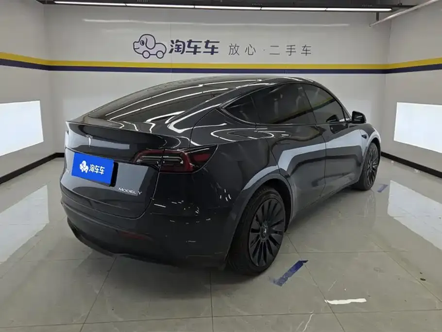 Tesla Model Y — фото 5