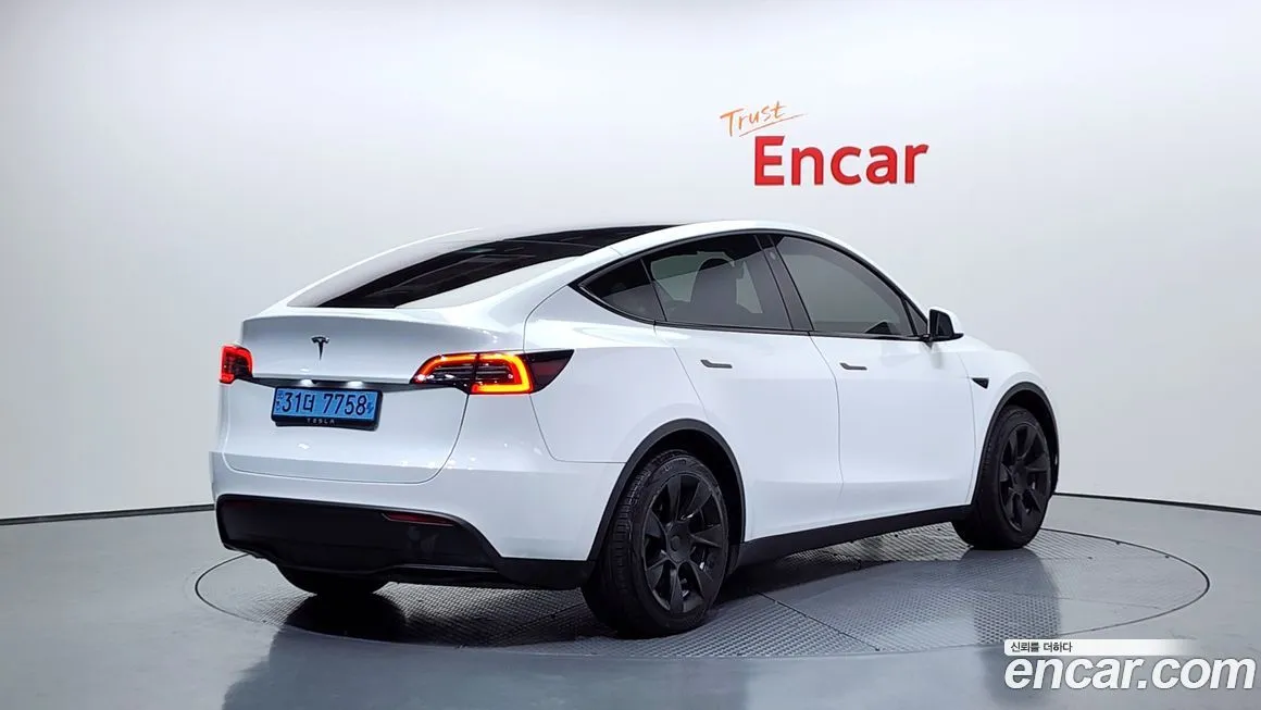 Tesla Model Y 2024 из KR, фото 2