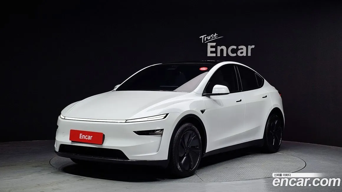 Tesla Model Y — фото 1
