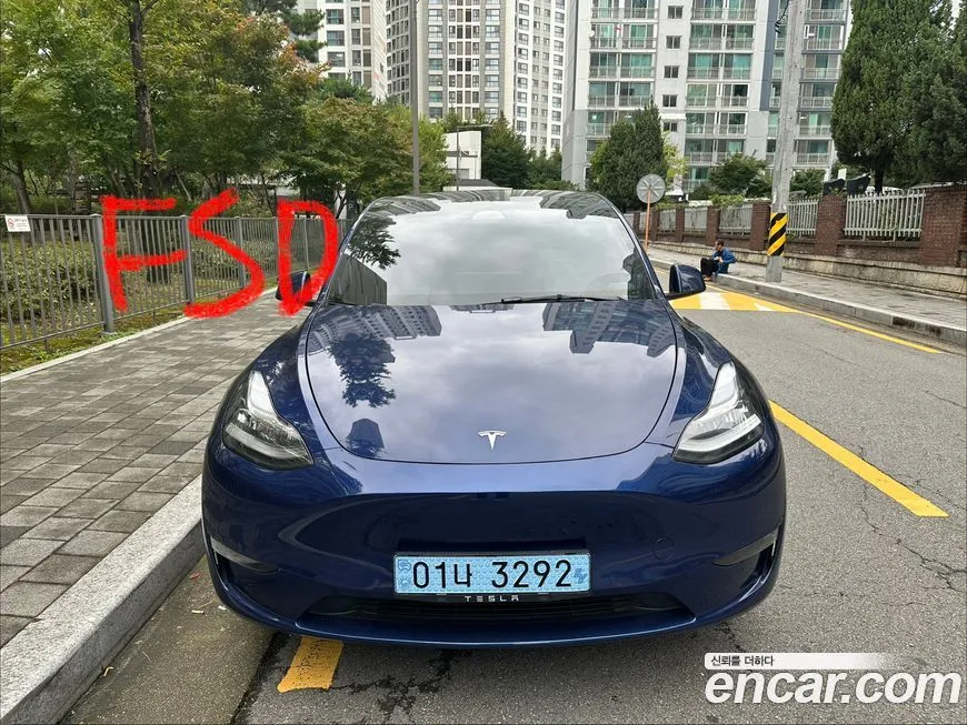 Tesla Model Y — фото 1