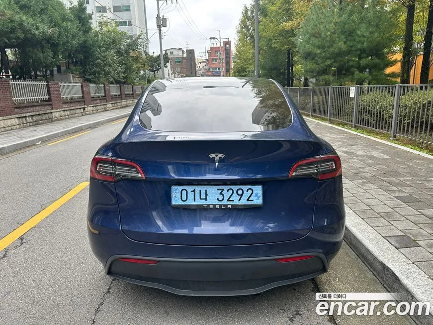 Tesla Model Y — фото 7