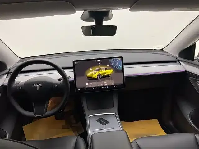 Tesla Model Y — фото 10