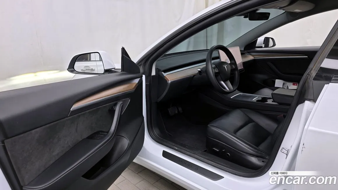 Tesla Model 3 — фото 7