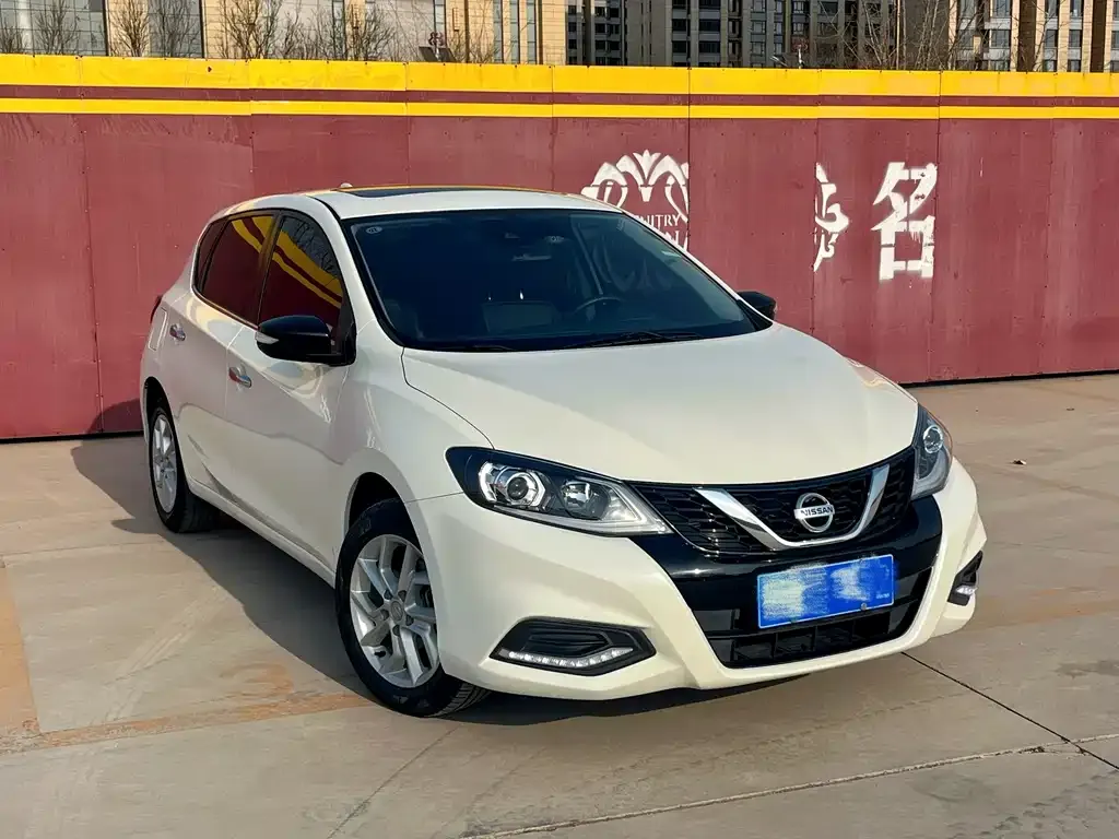 Nissan Tiida — фото 9