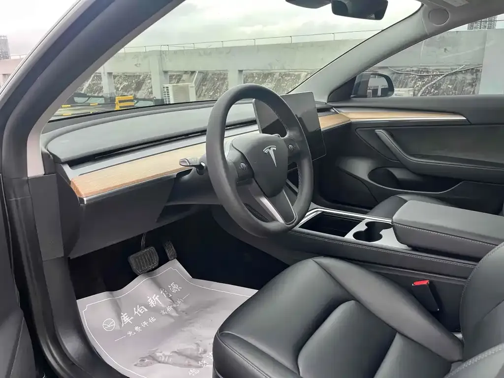 Tesla Model 3 — фото 9