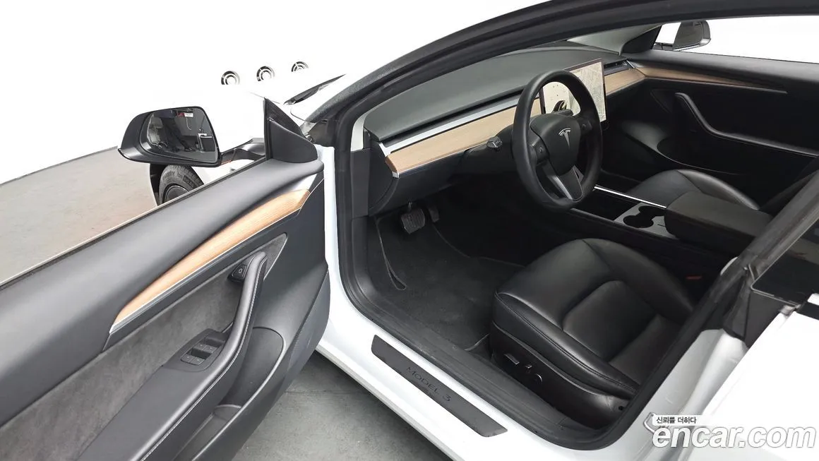 Tesla Model 3 — фото 10