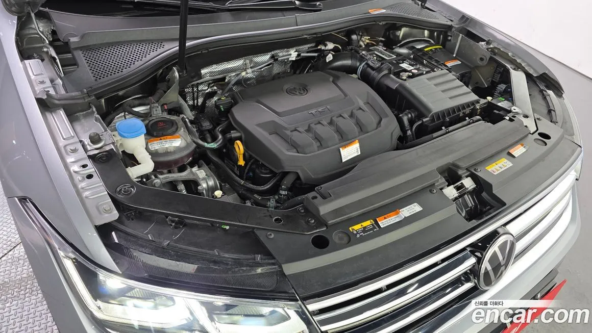 Volkswagen Tiguan — фото 10