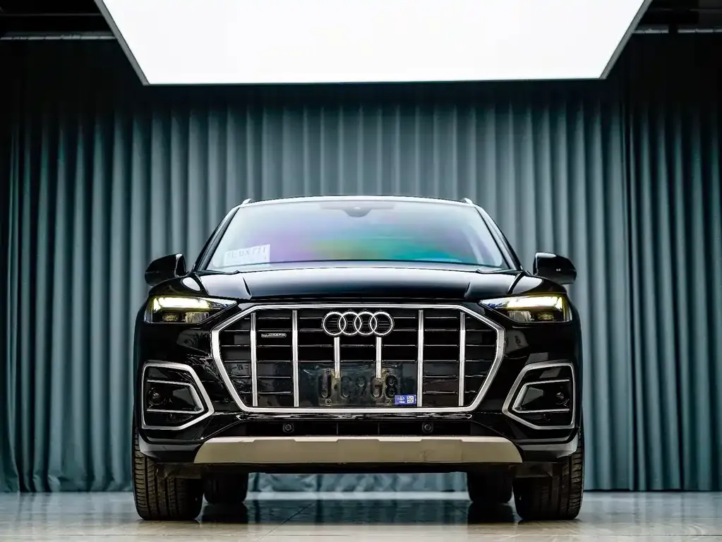 Audi Q5L — фото 5