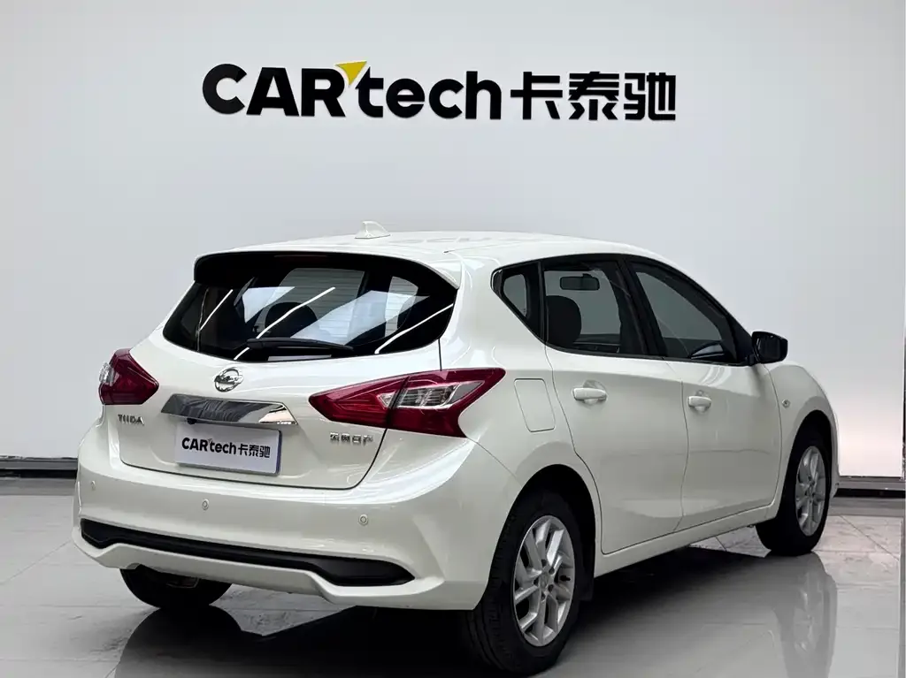 Nissan Tiida — фото 6