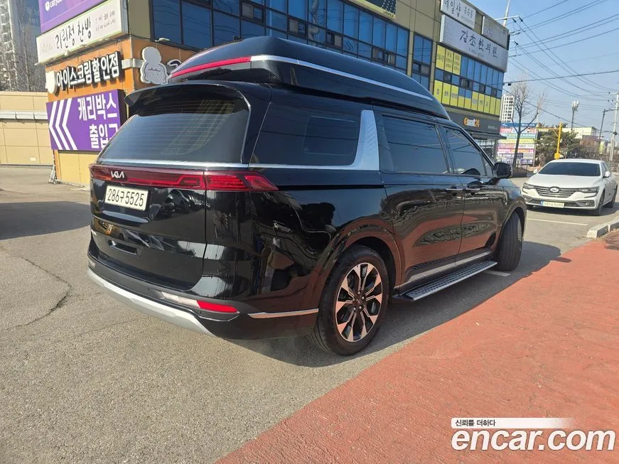 Kia Carnival — фото 10