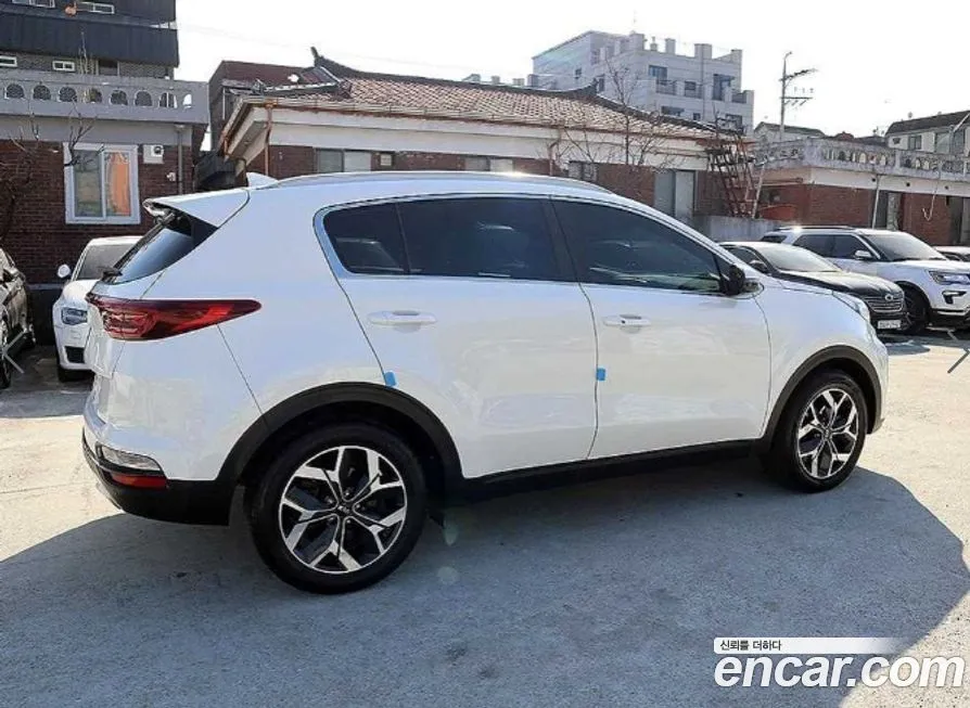 Kia Sportage — фото 10