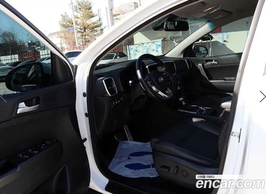 Kia Sportage — фото 7