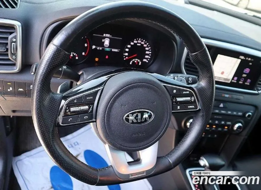 Kia Sportage — фото 9